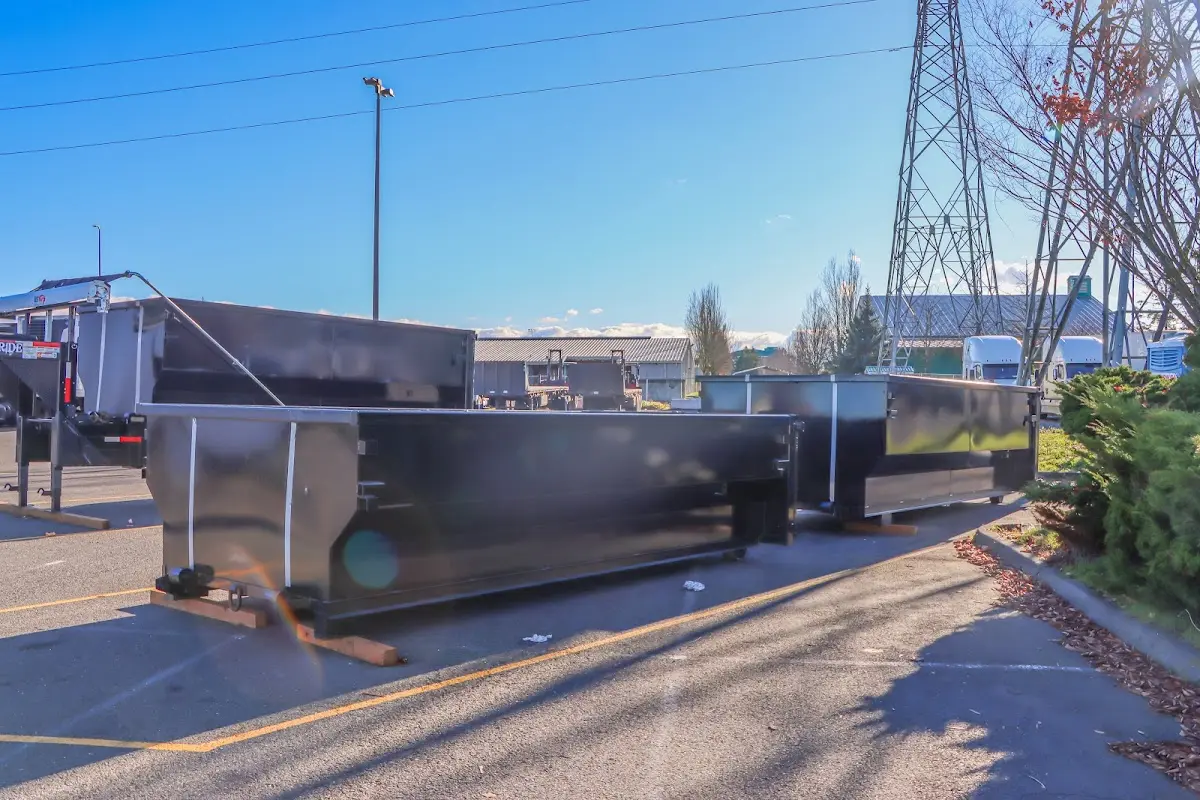 Roll-off dumpster ready for waste disposal at job site for 2 Yard Dumpster Rental in Onalaska